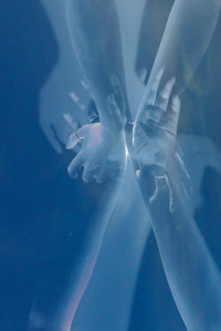 Cyanotype image of elegant hands - sleight of hand.
